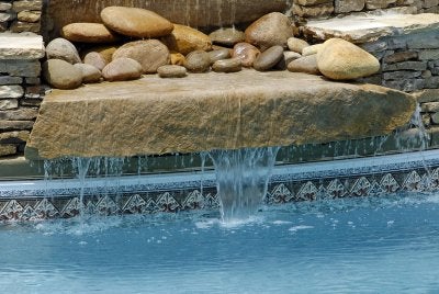 Beautified Swimming Pool Area by Deep Blue Pools and Spas